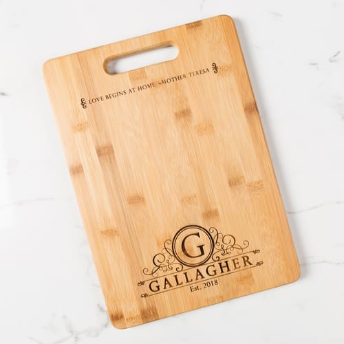 Love Begins at Home Cutting Board