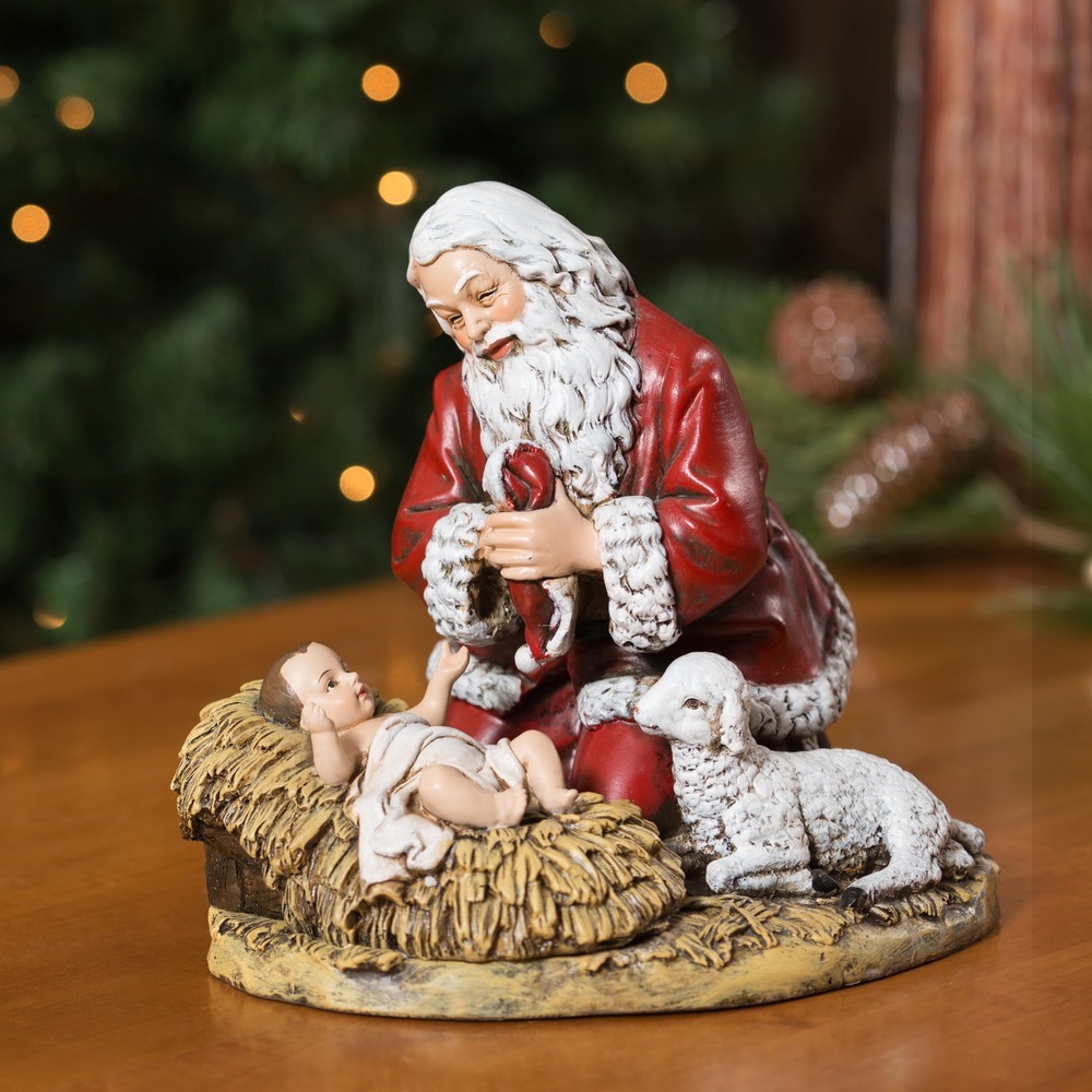 kneeling santa statue