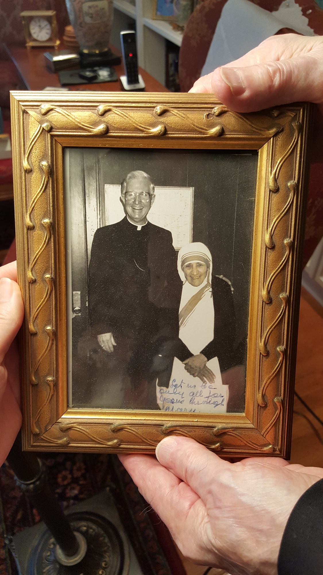 Bishop Curlin's autographed photo with Mother Teresa