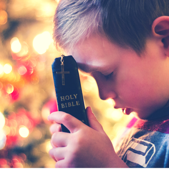 Child's praying at Christmas